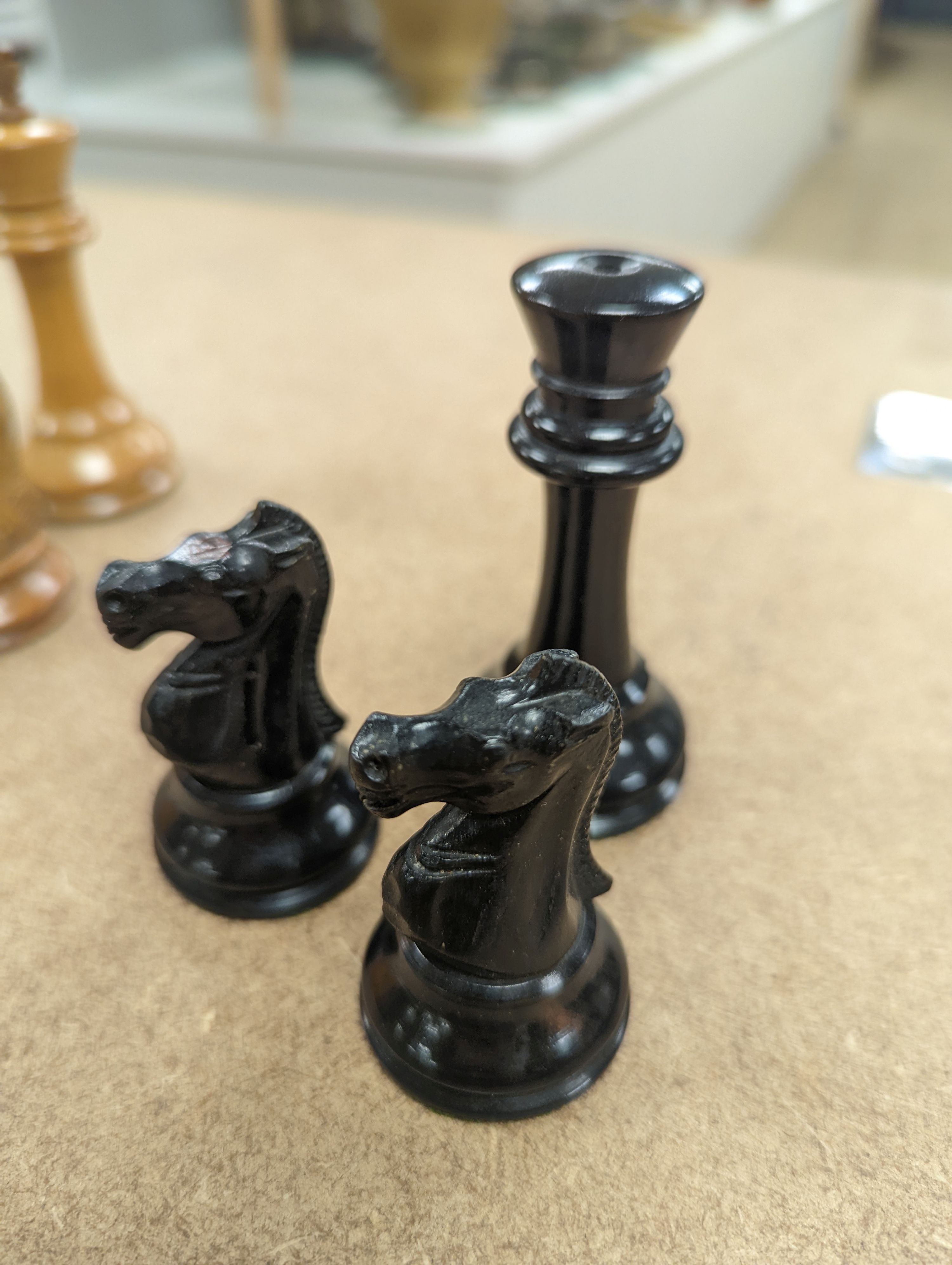 A Staunton chess set, some associate pieces and a miniature chess set. King height - 9cm